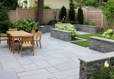 garden patio with stone and wooden features